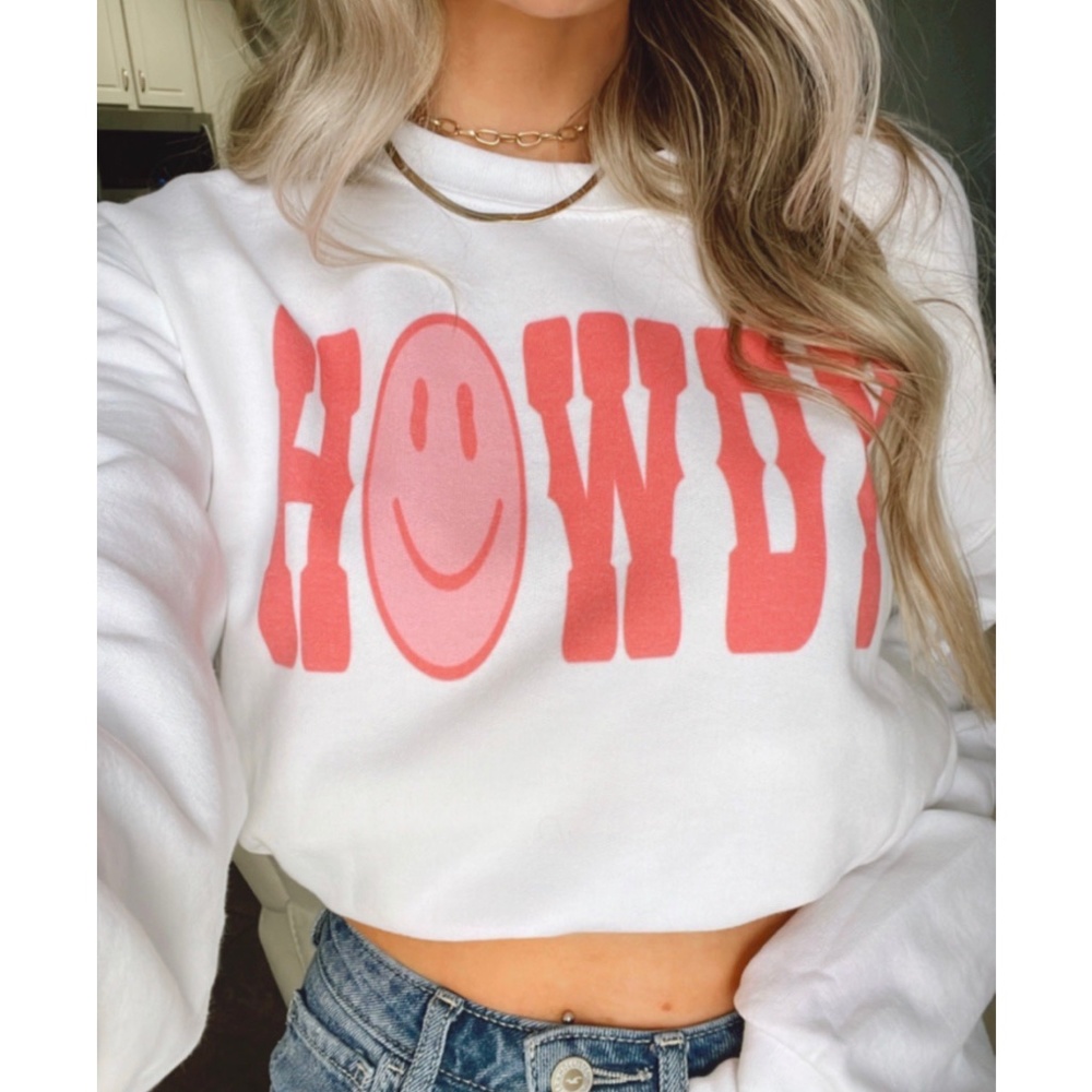Howdy smiley pink crewneck sweater